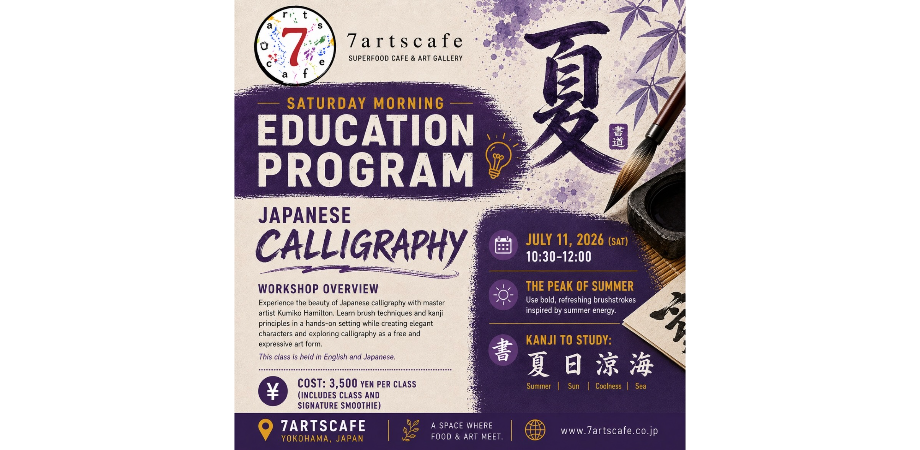 Student practicing brush strokes at a Japanese calligraphy class in Yokohama